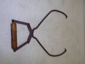lot 45 image: Antique Mpls Sanitary Ice Co. Ice Thongs Advertising
