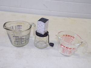 lot 84 image: Vintage Measuring Glass Cups and Nut Grinder