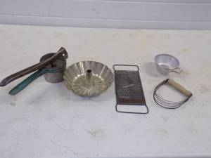 lot 102 image: Vintage Kitchen Utensil