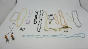 lot 52 image: Different Styles & Colors Of Beaded Necklaces & Bracelets & Some Pearl Earrings