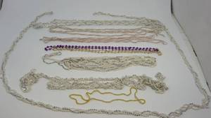 lot 54 image: Nine Miscellaneous Styles Of Pearl Necklaces