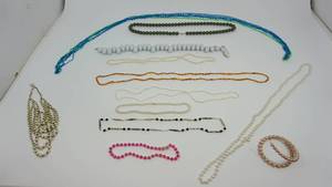 lot 66 image: Twelve Different Colors & Styles Of Necklaces