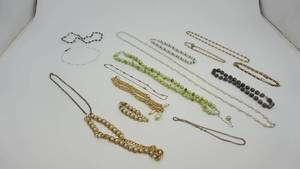 lot 67 image: Thirteen Different Colors & Styles Of Necklaces & One Pearl Bracelet