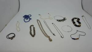 lot 72 image: Thirteen Different Styles Of Necklaces