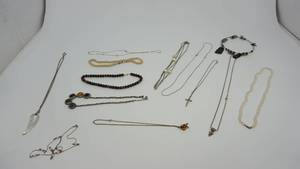 lot 76 image: Thirteen Different Styles Of Necklaces