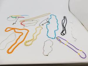 lot 70 image: Fourteen Styles & Different Colors Of Costume Necklaces