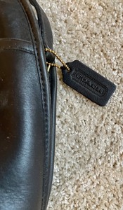 lot 12 image: Black Coach Purse