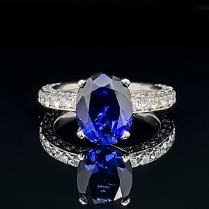 lot 4 image: Platinum 3.80ct. Oval Blue Sapphire & Diamond Pave Estate Ring w.1.50ctw. $7,750 Retail VIDEO