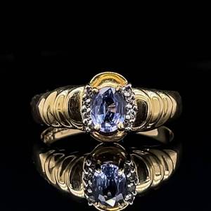 lot 37 image: Vibrant Beauty Oval Tanzanite Solitaire Scalloped Ocean Wave Seashell Estate Ring in 14k Yellow Gold