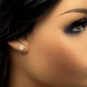 lot 21 image: Classic 14k Diamond Stud Earring  .60 carat. Single Stud for Lady or Gents. See photo for size perspective. No Reserve