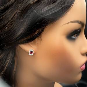 lot 73 image: Stunning Color Oval Garnet & Diamond Halo Cluster Stud Earrings in 14k White Gold.