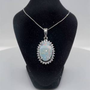 lot 68 image: Estate Shimmering White Opal & Glittering Cubic Zirconia Oval Cluster Pendant in 925 Sterling Silver