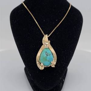 lot 75 image: Southwestern Influence Nugget Natural Turquoise Estate Pendant in 14k Yellow Gold Textured & Bright Shine Finish