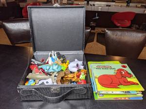 lot 177 image: Black Case with Handle Filled with Kids Books & Toys