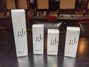 lot 106 image: Glo Skincare Body Spray, Daily Hydration, Detox Mask, and Sunscreen - New