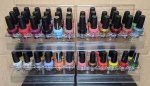 lot 35 image: Lot of 50 OPI Nail Polishes (Variety of Shades) and 2 Polish Storage Racks