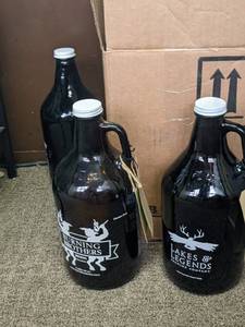 lot 179 image: Collection of 7 Glass Growlers from Various Breweries