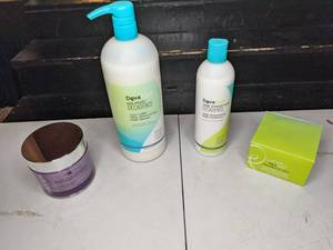 lot 151 image: New Haircare Products Blacklights Intensive Replenishing Mask, DevaCurl No-Poo Decadence Moisturizing Milk Cleanser and One Condition Decadence, and DevaCurl Heaven in Hair Moisturizing Deep Conditioner
