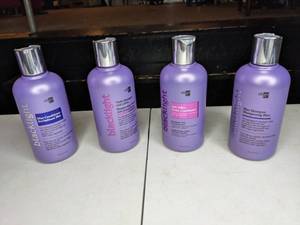 lot 124 image: NEW Set of 4 Bottles Oligo Blacklight Blue and Violet Shampoo and Conditioner