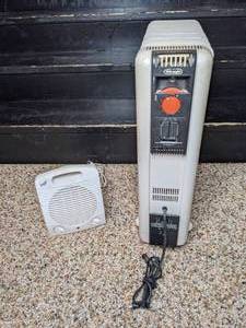 lot 139 image: Comfort Zone Portable Heater and DeLonghi Electric Heater