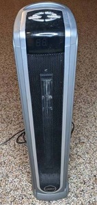 lot 26 image: Lasko Tower Heater, 1500W, Oscillating