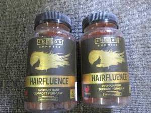 zhzou gummies hairfluence 2 bottles...