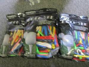 4 bags of golf tees ...