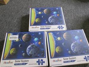 3 solar system puzzles ...