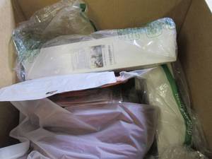 box of placemats, neck gaitors and ...