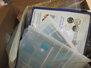 box of party supplies, stove range ...