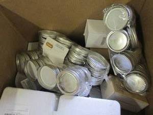 lot of canning lids and bands and s...