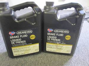 21 gallon jugs of wearever carques...