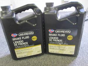 21 gallon jugs of wearever carques...