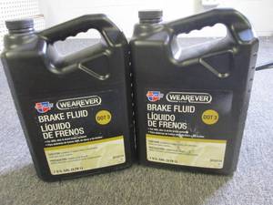21 gallon jugs of wearever carques...