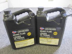 21 gallon jugs of wearever carques...