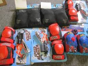 lot of boys knee pads and card and ...