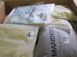box of decorative pillow covers ...