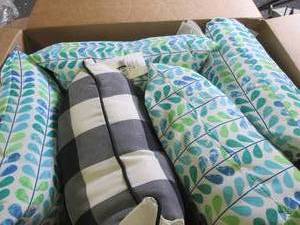 box of decorative pillows ...