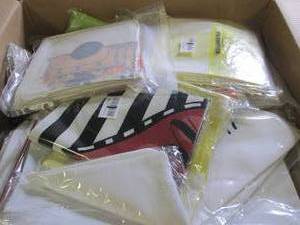 box of decorative pillow covers...