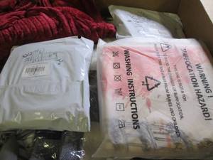 box of decorative pillow covers...