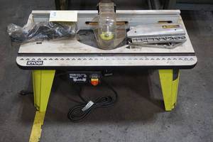 lot 31 image: Ryobi 2HP Corded Router with Table