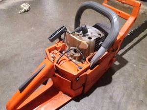 HUSQUVARNA 51 Chainsaw appears to have had the carburetor removed for repairs but wasnt reassembled. Cosmetically in good condition. HAS GOOD COMPRESSION See Pictures