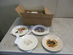 Place setting of 4 dishes plus set of 4 season plates