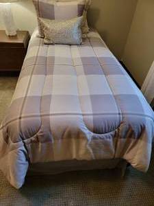 lot 103 image: Plaid Twin Bed Comforter Set with Decorative Pillows, a
