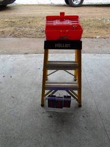 2 fiberglass keler ladder with tool box & tools. As shown.