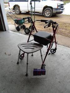 Nearly new walker & bath stool. As shown.