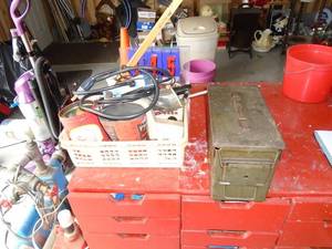 Ammo can & basket with grease gun & misc. As shown.