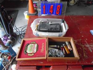 Cigarette maker & cigar box of lighters. As shown.