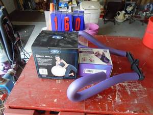 Exercise ball, thigh master, weights. As shown.