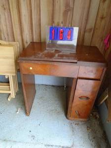 Graybar sewing machine in cabinet. As shown.